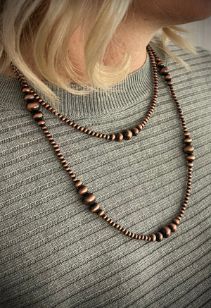 
            
                Load image into Gallery viewer, Candace Double Copper Navajo Pearl Necklace
            
        